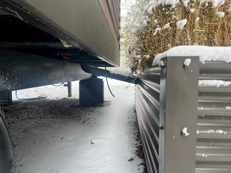 Tiny house mulch basin in the winter